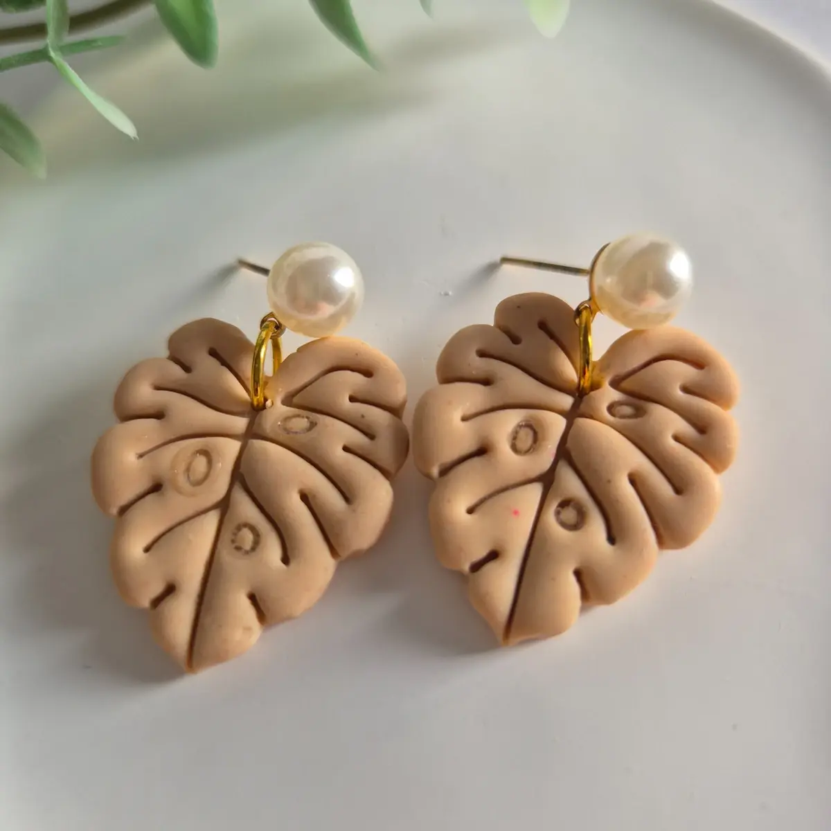 Nude monstera leaf statement earrings with pearl stud