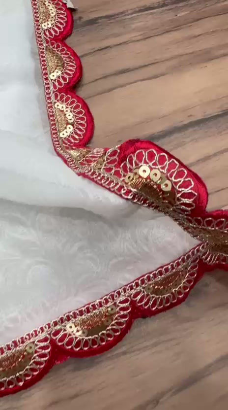 Thumbnail: Beautiful white and red georgette saree