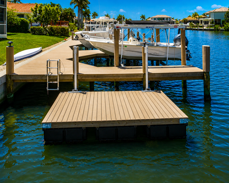 Floating Dock built by Collier Seawall and Dock LLC Beside Dock.
