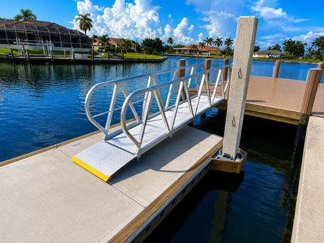 Floating Dock With Concrete Piles, Built by Collier Seawall and Dock LLC.