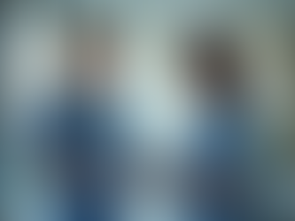 2 physician assistants discussing a chart