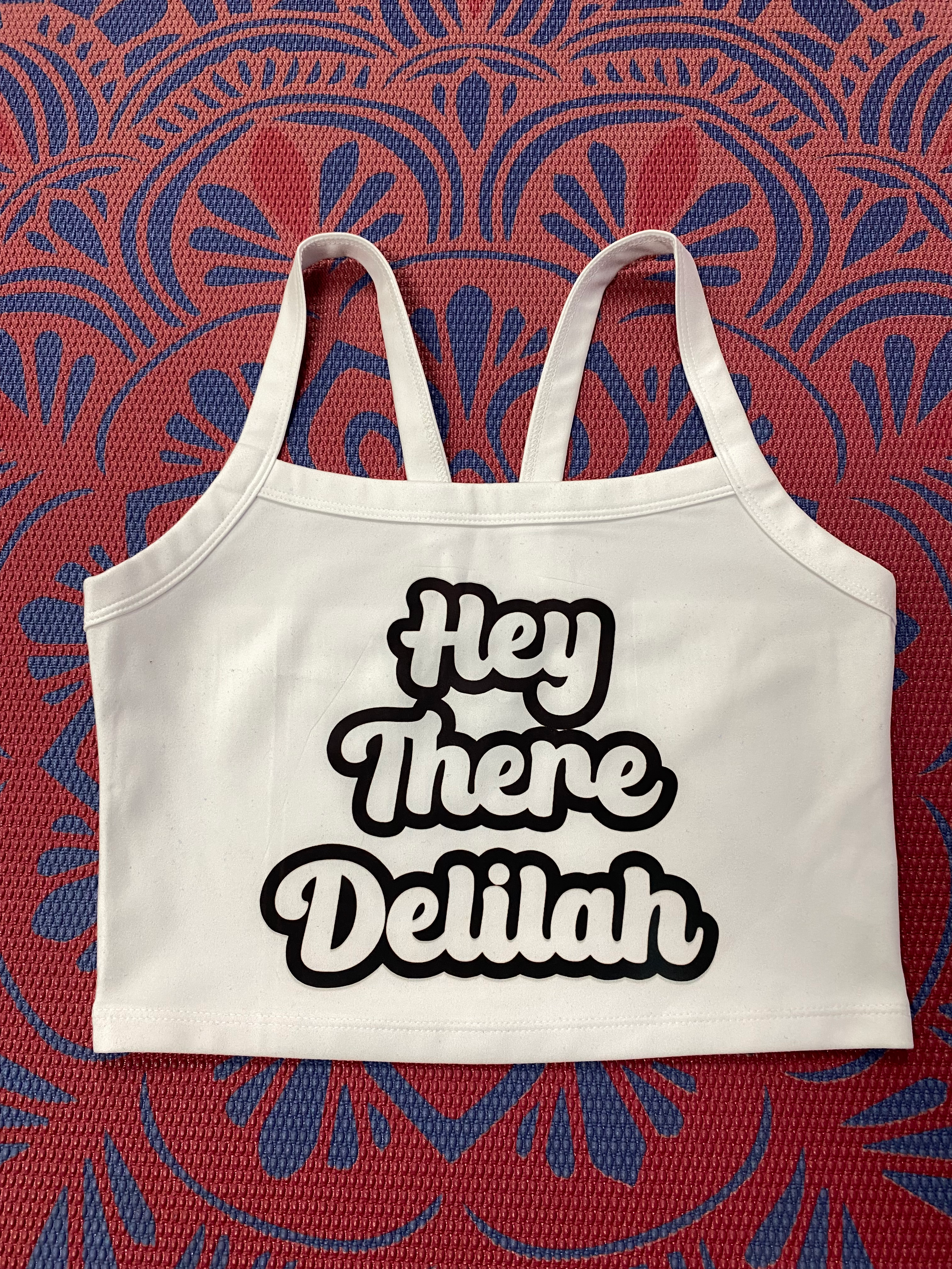 HTD white cami crop black font