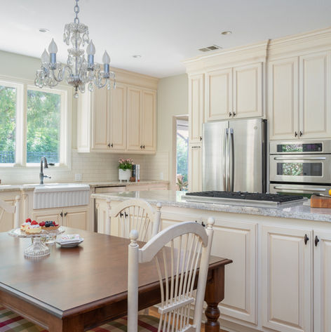 Comfortable French style kitchen with vintage touches in the Tustin Ranch neighborhood of Tustin, CA