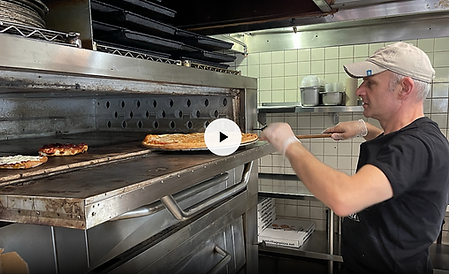 An immigrant's journey from delivery driver to pizza business owner