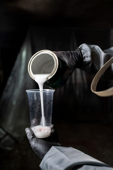 side-view-worker-pouring-paint.jpg