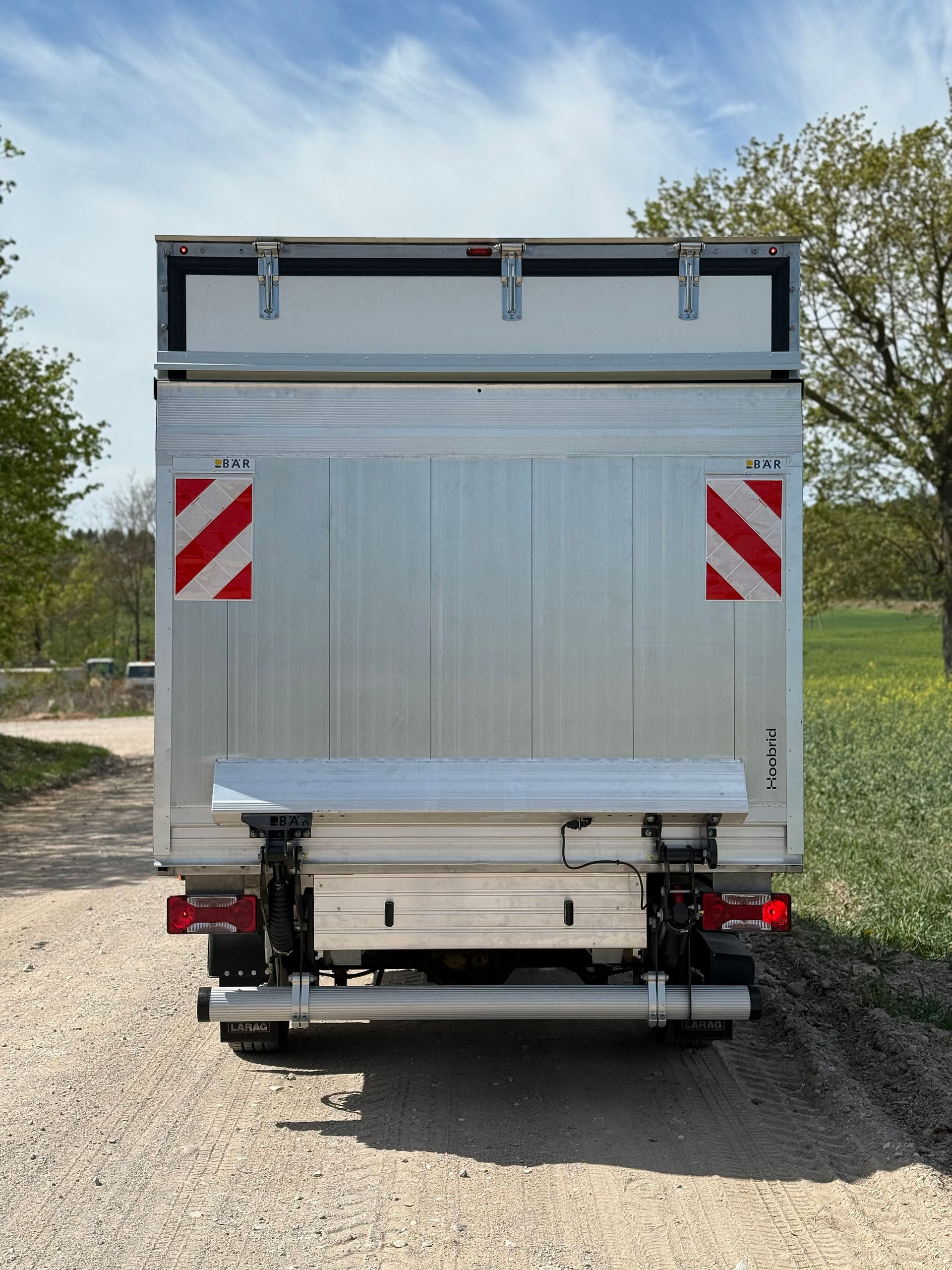 Mercedes-Benz Sprinter 2014 with a brand new FNA type body from Hoobrid, featuring BAR cargolift and Carrier refrigeration equipment