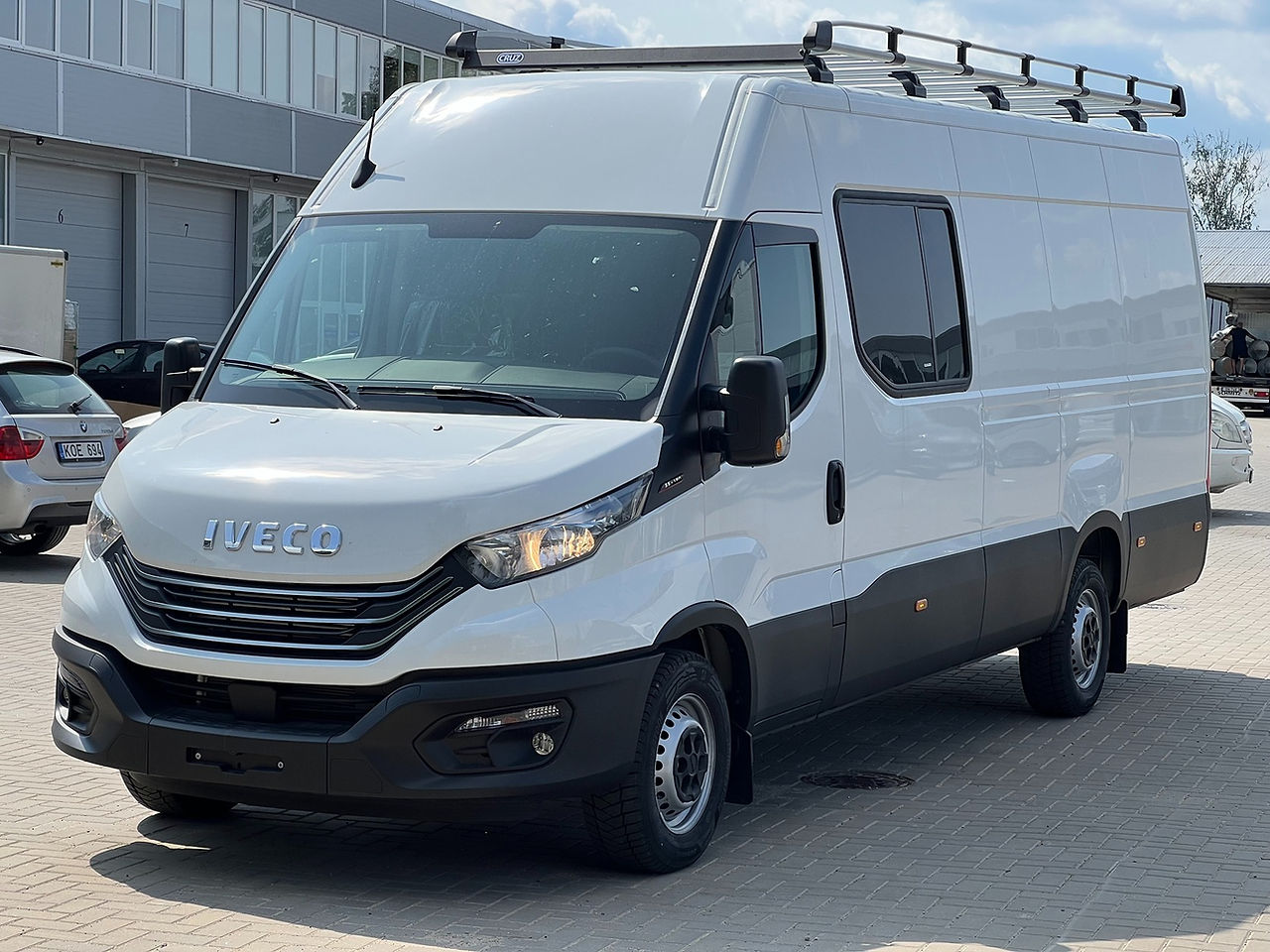 Iveco Daily van with Hoobrid's crew cab conversion, Kore van linings and Cruz roof rack and ladders