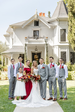 family photo by victorian home