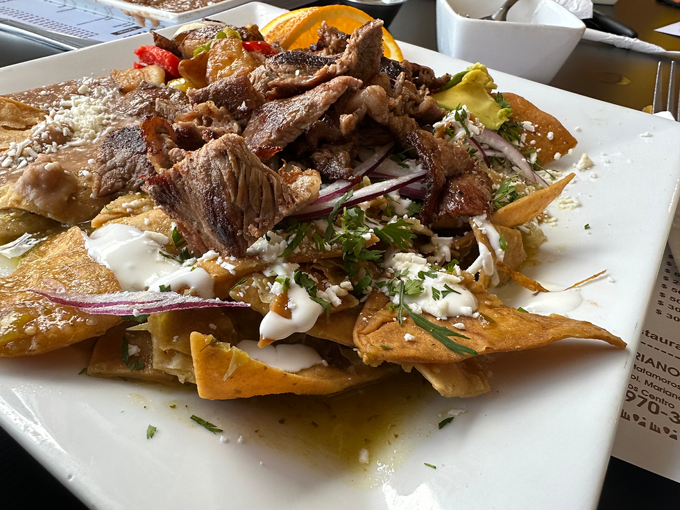 Chilaquiles with steak at Once Once.