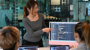 Team reviewing code while controlling AI agent costs