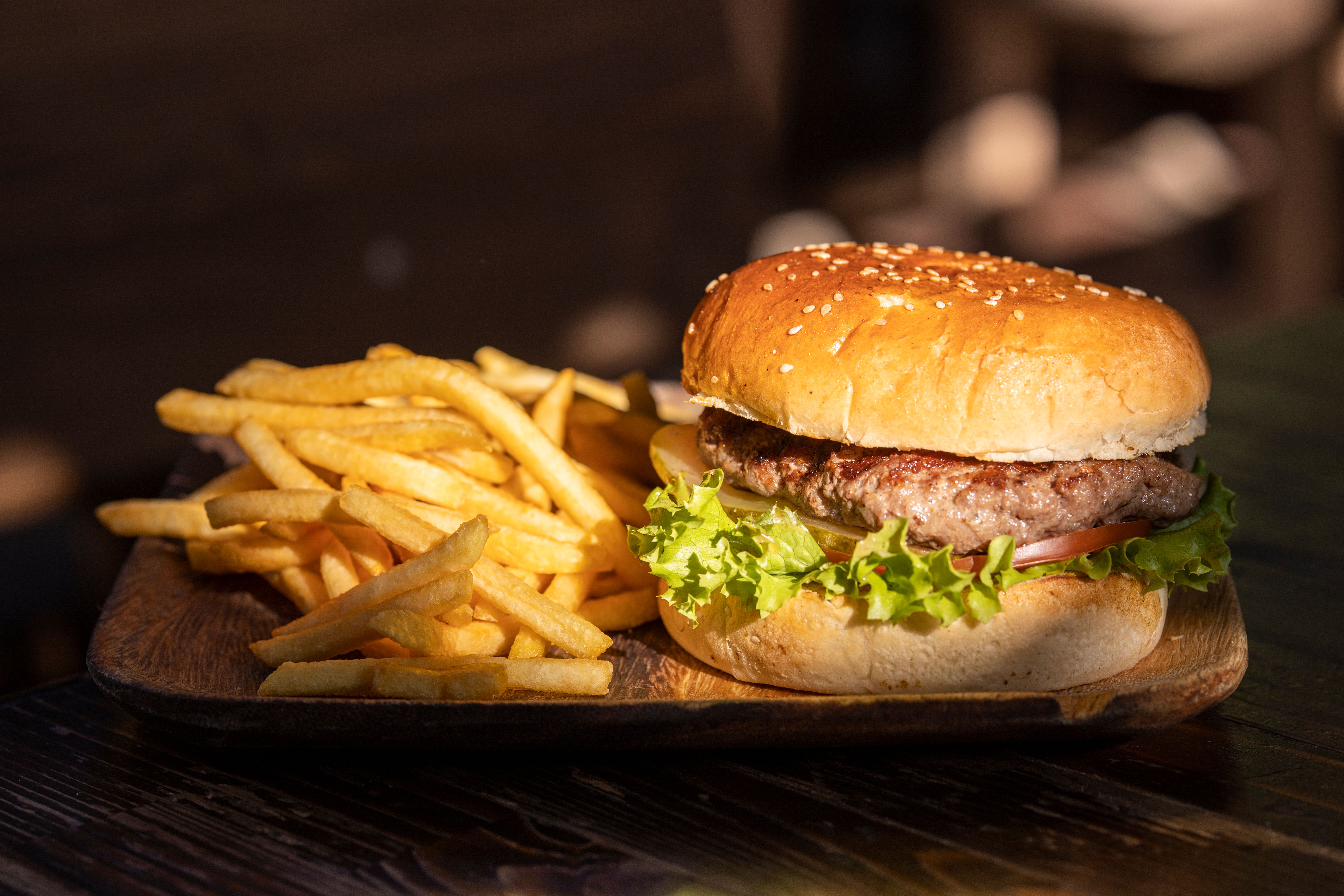 Cheeseburger with fries; illustrative photograph