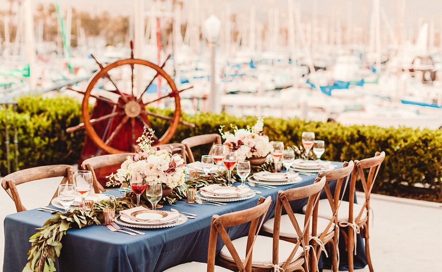 Santa Barbara wedding photographer, Rewind Photography, captures the gorgeous waterfront wedding venue of the Santa Barbara Maritime Museum. Featuring wedding flowers from Emma Rose Floral, linens from Luxe Linen, rentals from Ventura Rentals and specialty desserts from Sweet Lisi's, Cinnies, Your Cake Baker and Renaud's Patisserie. This beautiful shoot was coordinated by Gatherings for Good.