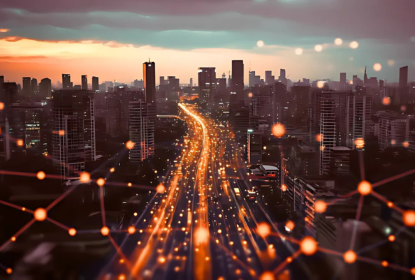 cidade iluminada com carros
