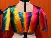 Mannequin with partially sewn rainbow dress