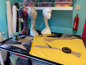 Sewing table with fabric and scissors laid out