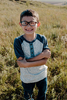 Braxton is very fun kid to be around. He is very verbal and loves asking questions. He loves all things farming and can sit in a tractor or combine with his dad for hours. He also enjoys role playing such as, doctor, farmer, firefighter, businessman, chef/waiter, band, police officer. He is extremely responsible and loves organizing. He is great with logistics of figuring out where everything should be/is during planting and harvest season on our farm. He can easily get overstimulated and deregulated. He is learning coping strategies for how to identify his emotions and how to regulate his body when this happens. Together we are learning his triggers and how to help him through the hard times. I am hopeful that so many researchers are on board with learning more about DLG4. Even if we don’t find a cure for our kids, there is hope for the future as we learn more about it.