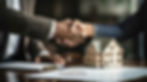 Property deal, shaking hands