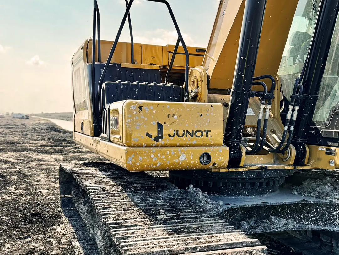 Closeup of Junot logo on excavator in Lafayette Louisiana
