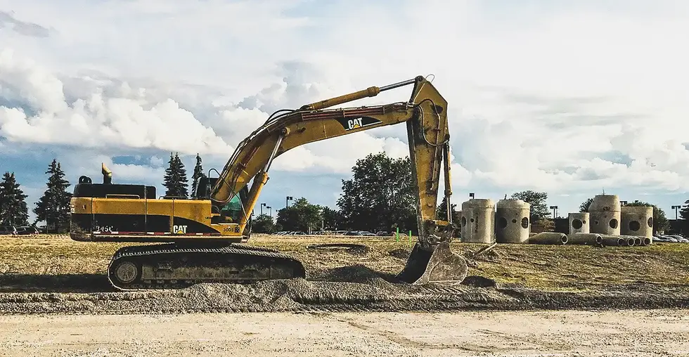 utility infrastructure project site with caterpillar heavy machinery