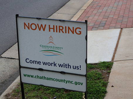 A Now Hiring sign representing the stronger-than-expected August 2026 U.S. jobs report