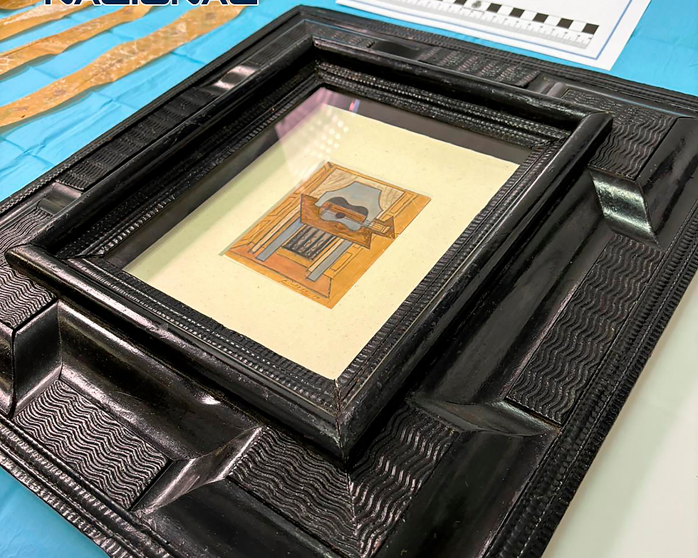 Still Life with Guitar, a 1919 gouache and pencil work valued at about €600,000, has been found by police after disappearing in October. Photograph: Spanish National Police/AFP/Getty Images