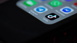 TikTok application icon displayed on a smartphone