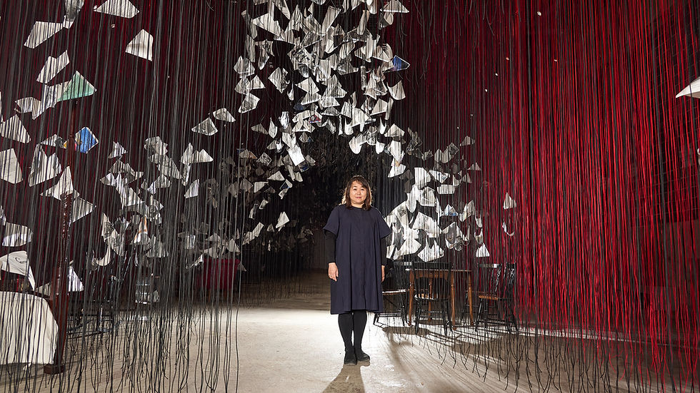 The artist Chiharu Shiota at ICA Watershed, a massive exhibition space at an active shipyard in East Boston. Philip Keith for The New York Times