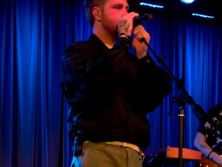 Alex Warren performing at the GRAMMY Museum before his October 2026 return with Wildchild