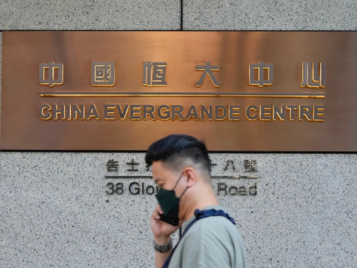 China Evergrande's delisting from Hong Kong stock exchange marks a symbolic end for the fallen real estate titan amid a crippling debt collapse
