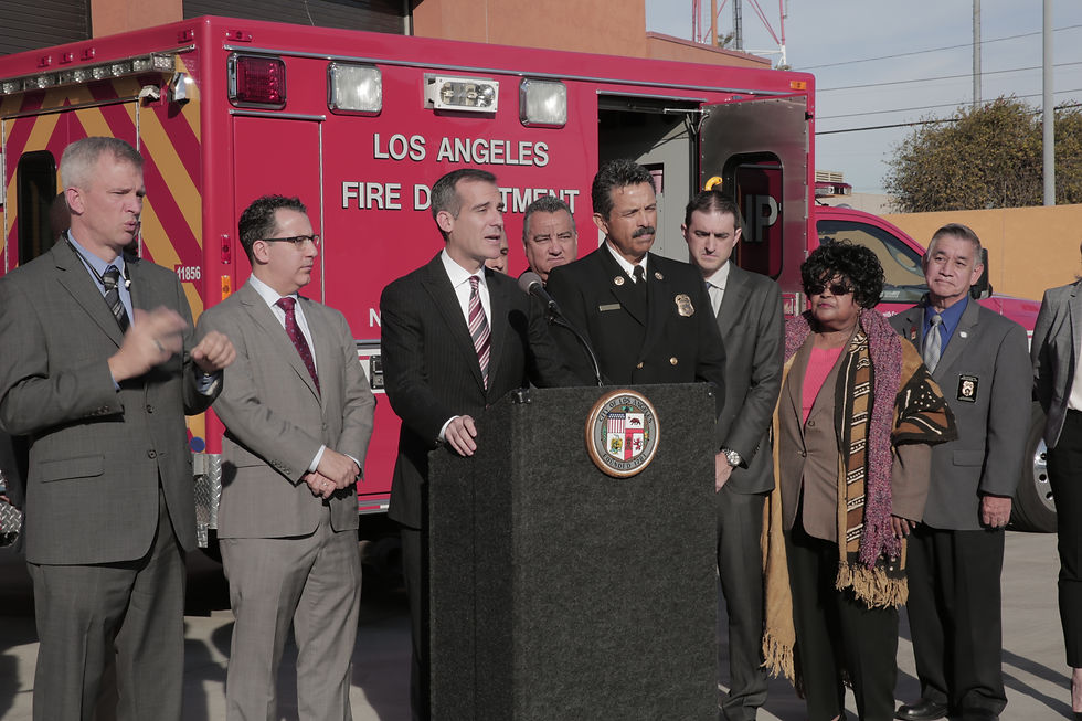 Los Angeles Fire Department personnel gathered during a public safety event