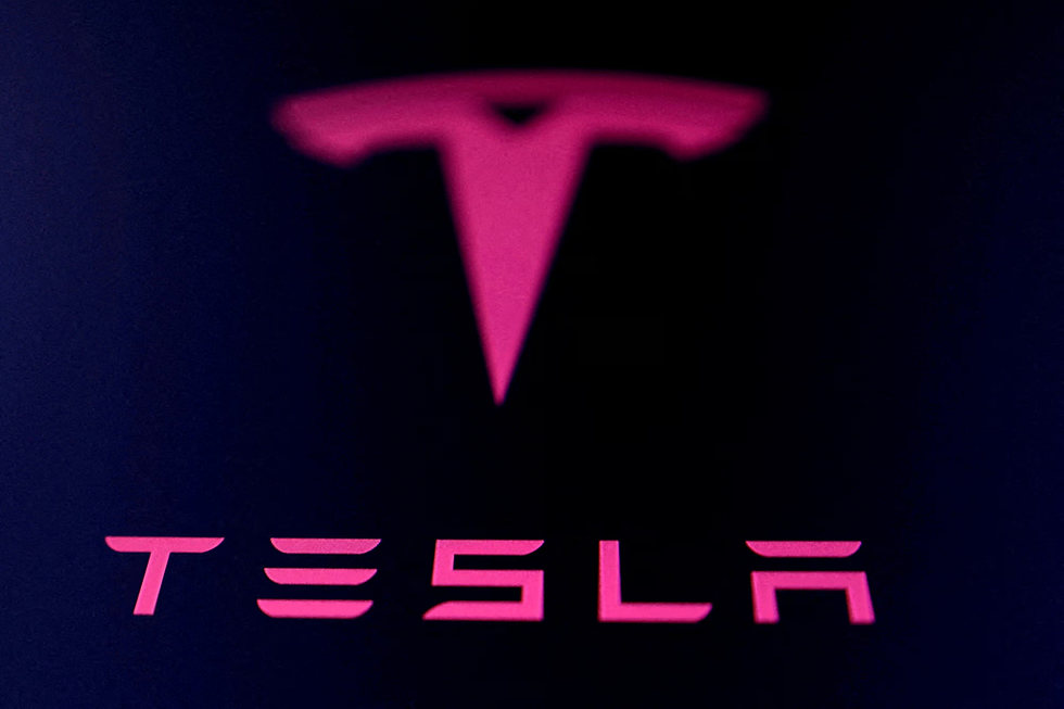 Tesla logo is seen in this illustration taken July 23, 2025. REUTERS/Dado Ruvic/Illustration/