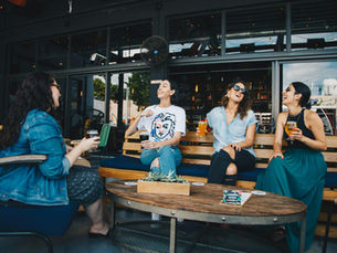 a group of female friends talking to each other