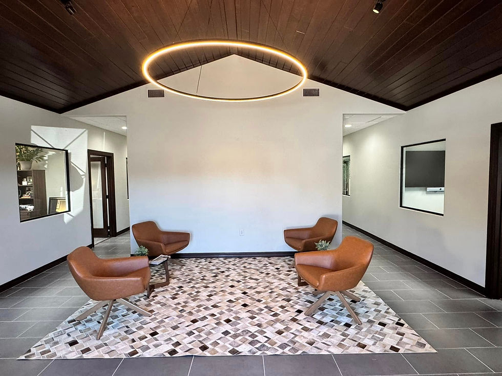 Open-concept home interior with natural lighting and custom finishes