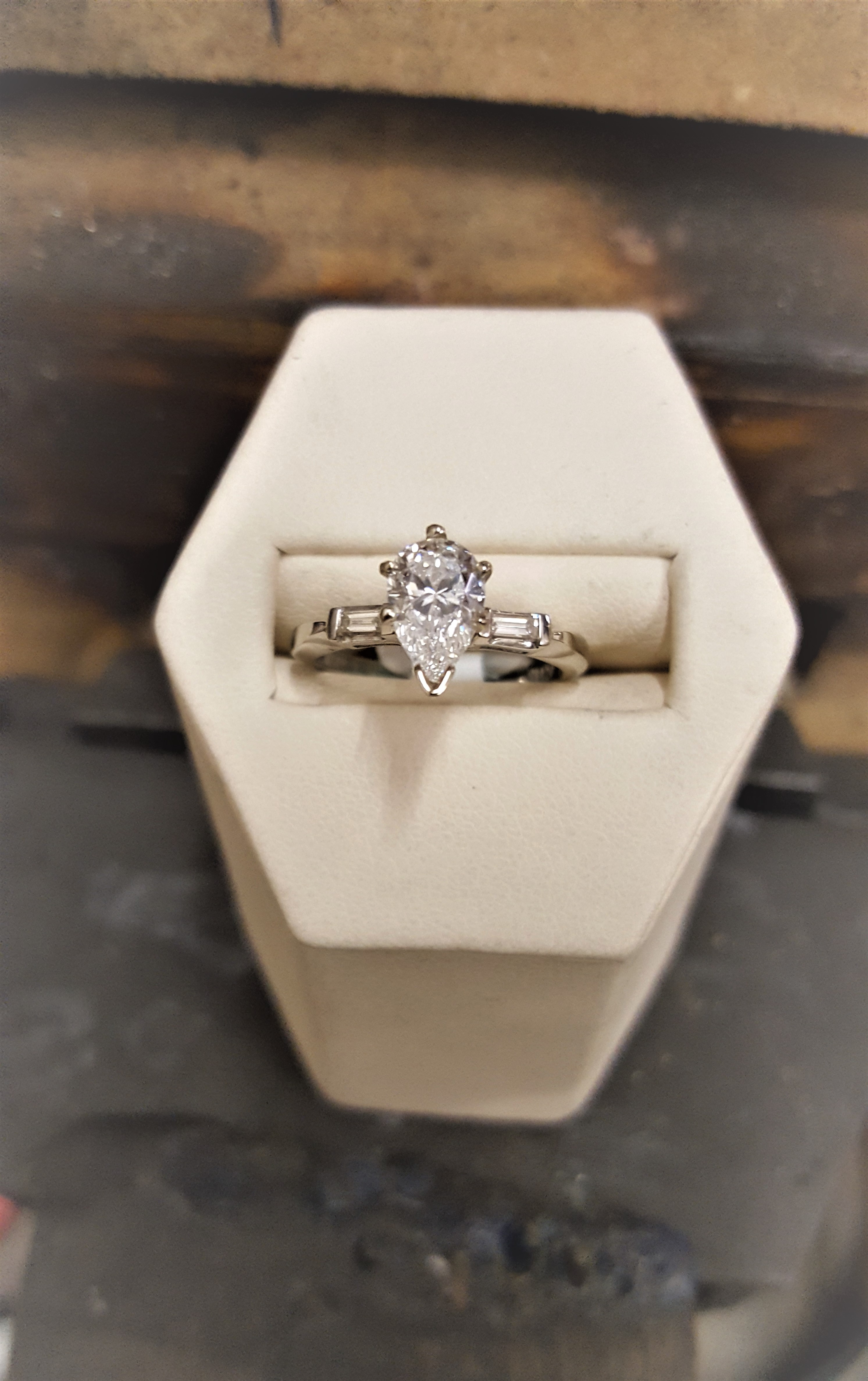 .83ct Pear with .15ctw Baguettes