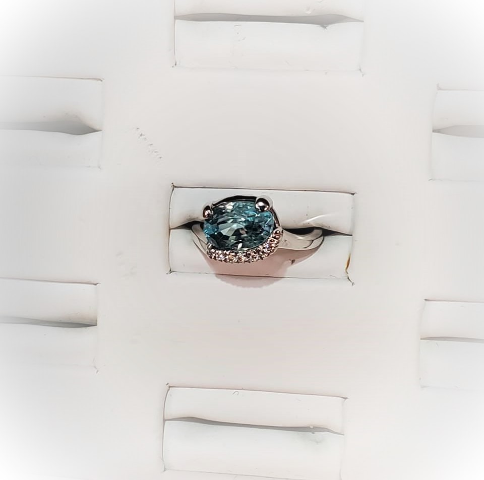 3.92ct Blue Zircon .10ctw Diamonds