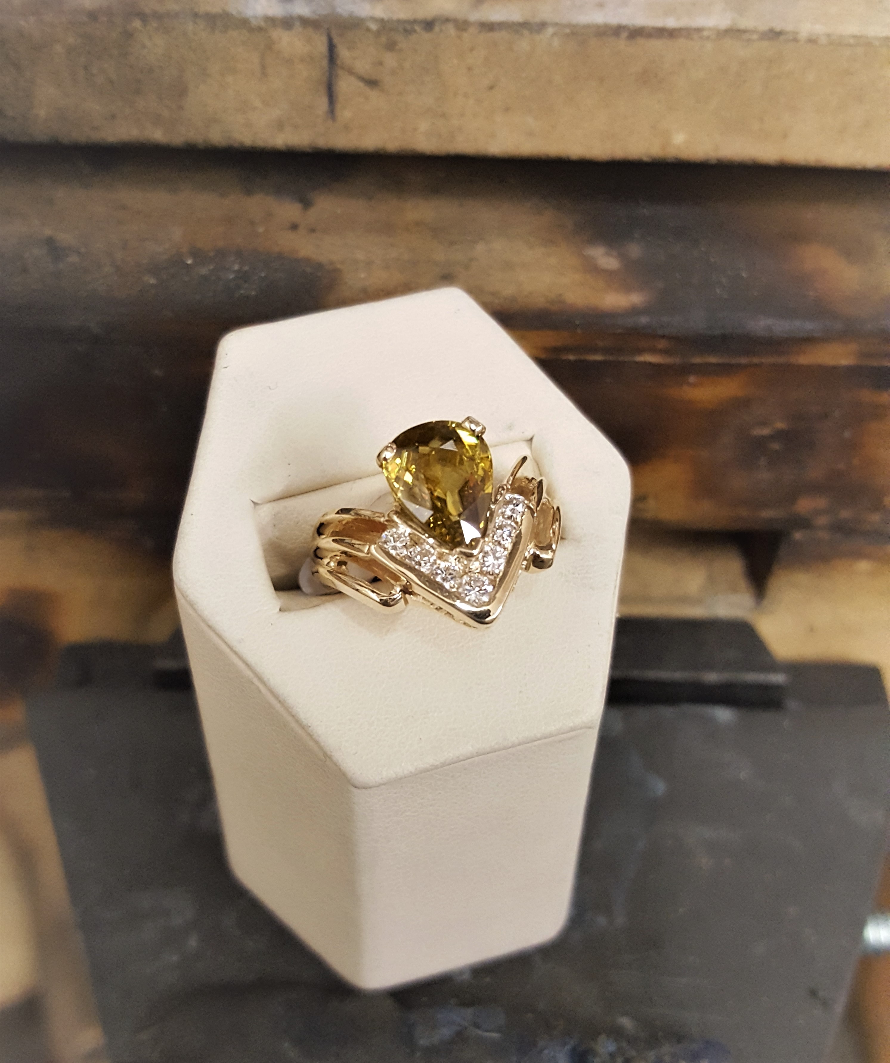 2.97 Pear Titanite .40ctw Diamonds