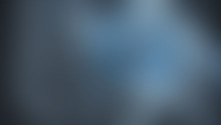 Aerial surveillance image showing cars on a road, viewed through a targeting overlay—simulating how drones can capture and analyze real-time activity.