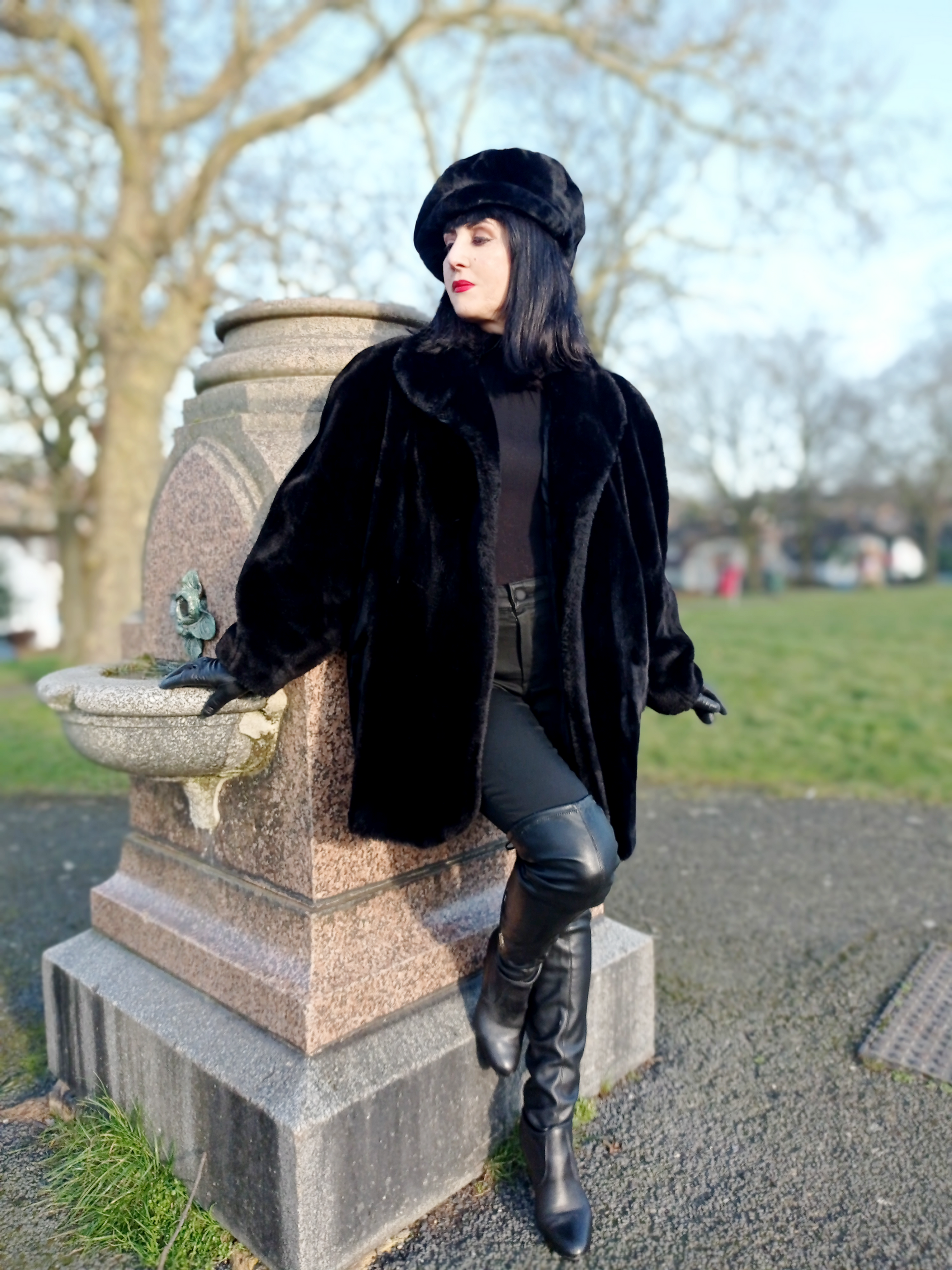 Vintage sleek black 1980s luxury Michel Alexis Paris power faux fur coat