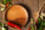 Empty plate with vegetable on wooden background..jpg