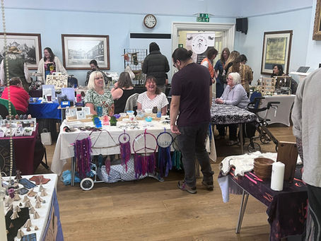 an image of our market running in Romsey Town Hall