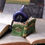 Thumbnail: Kitty's Grimoire Cat Figurine in Green 8.2cm in situ