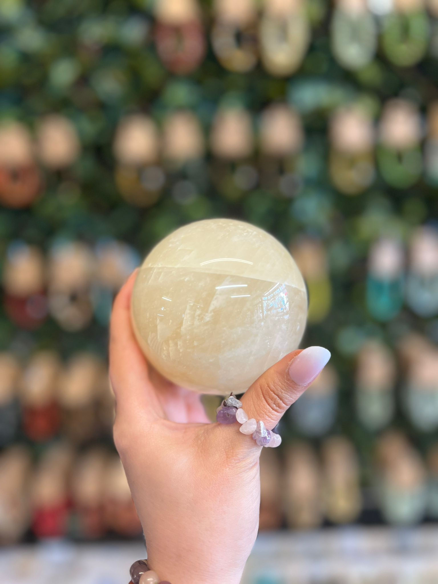 Yellow Calcite Sphere Polished Carving front