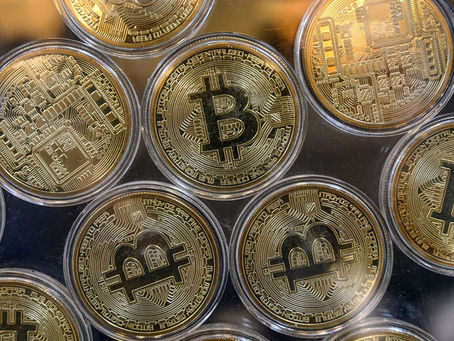 Bitcoin Approaches $67K Amid Market Volatility, UNI Rallies 9%