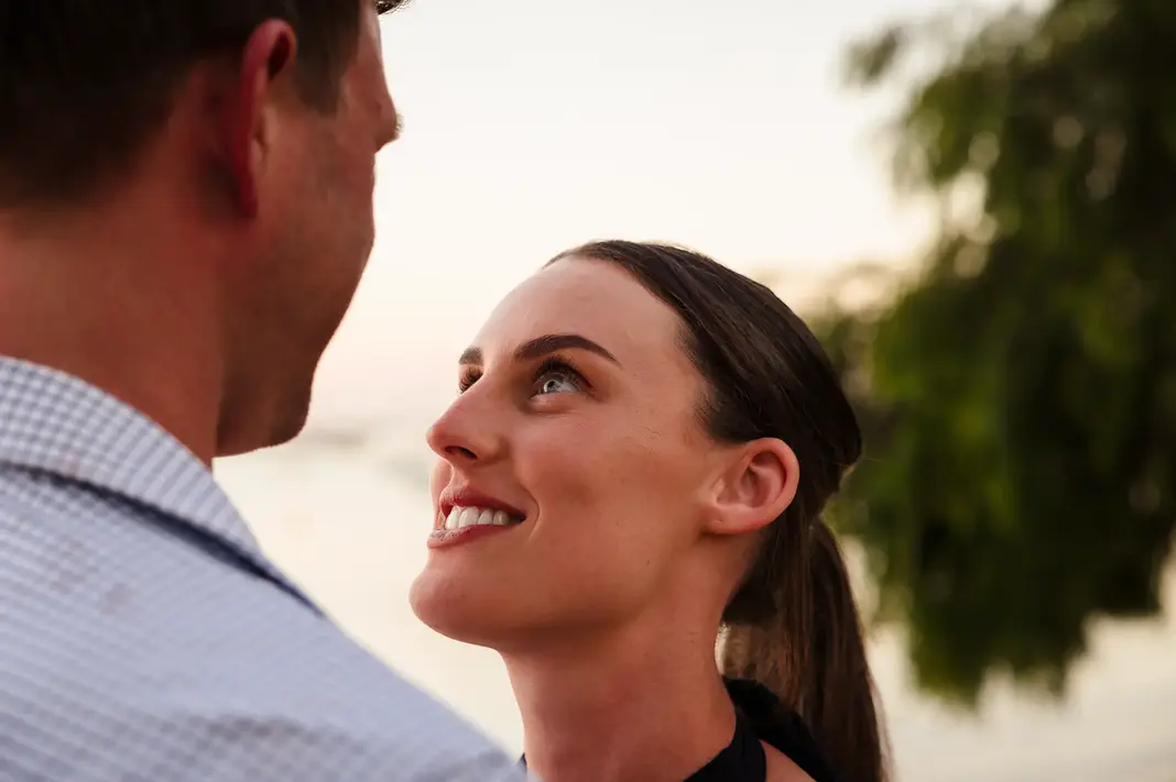 Close-up of Baleigh gazing lovingly at Kailym during sunset at Matilda Bay Reserve.