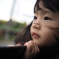 Child Looking Outdoors