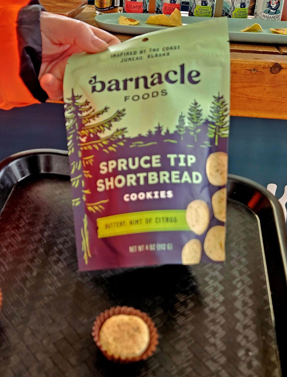 Barnacle Foods bag holding Spruce Tip Shortbread.