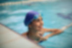 Woman swimming a healthy lifestyle and exercise tips for staying energetic.