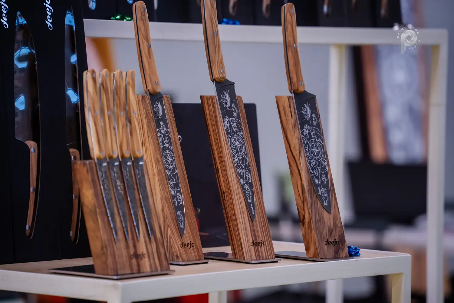 Laser engraved knives mounted on a stick