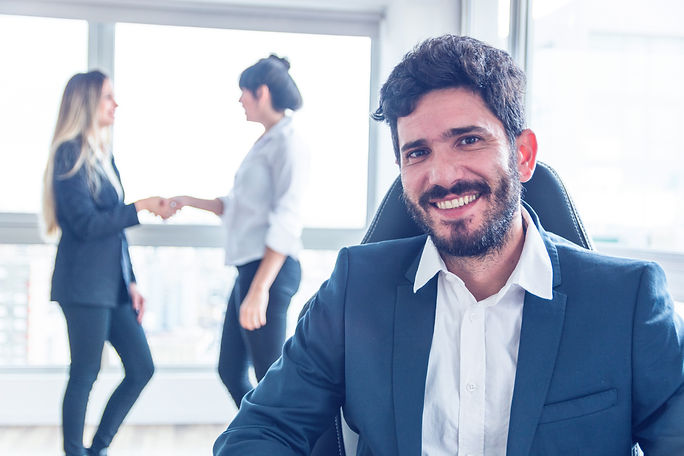 two-businessman-analyzing-company-financial-report.jpg