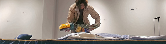 Miguel Gamez-Macias setting up "Broken promises you've given me." for an exhibition.